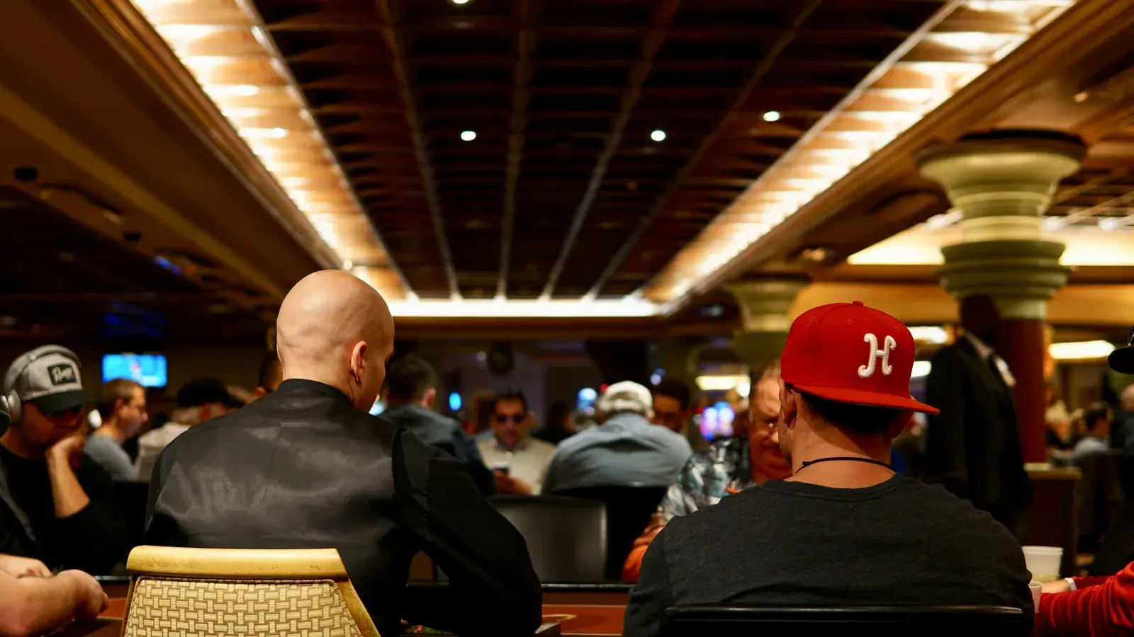 Spectators watching screens in a sportsbook