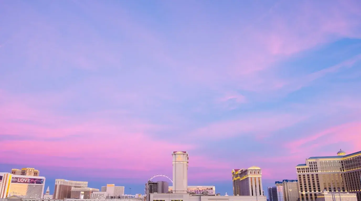 Las Vegas strip skyline under a pink and blue dusk sky